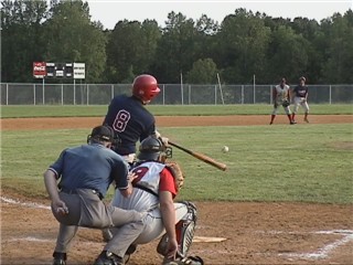 Tim Hammond drives a liner to center for a hit