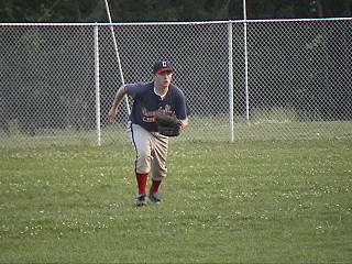 Left fielder Konis get's a big jump on the strike three call.