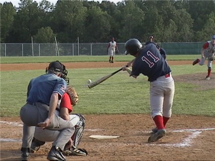 Joe Palumbo hammering the ball to the opposite field