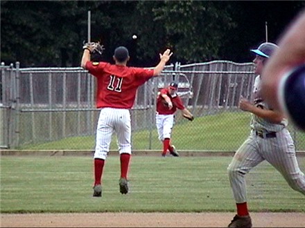 Brian Chesnick throws from the fence to Joe Palumbo