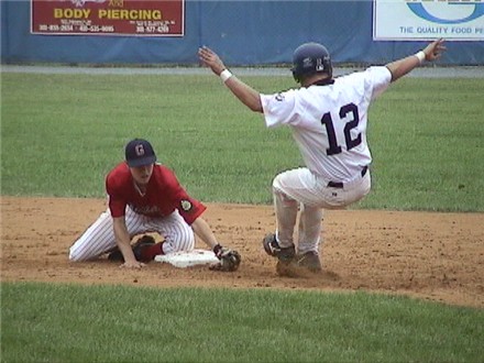 Joe Cook puts on the tag.